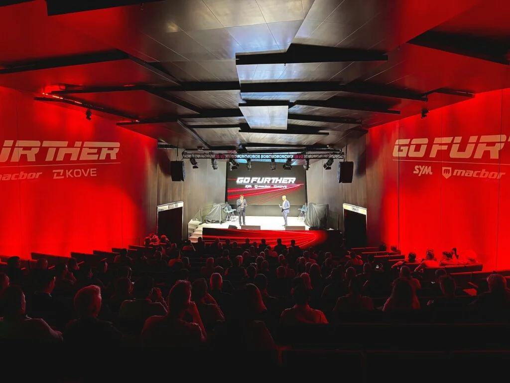The auditorium at Grupo Motos Bordoy’s “Go Further” convention, with set design by Mariona Agency