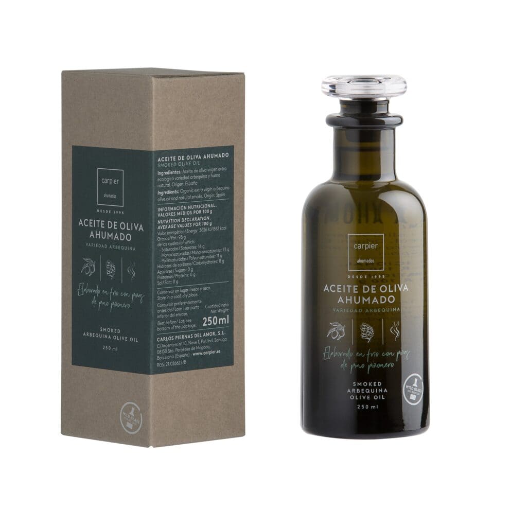 Botella y estuche del aceite de oliva ahumado de Carpier
