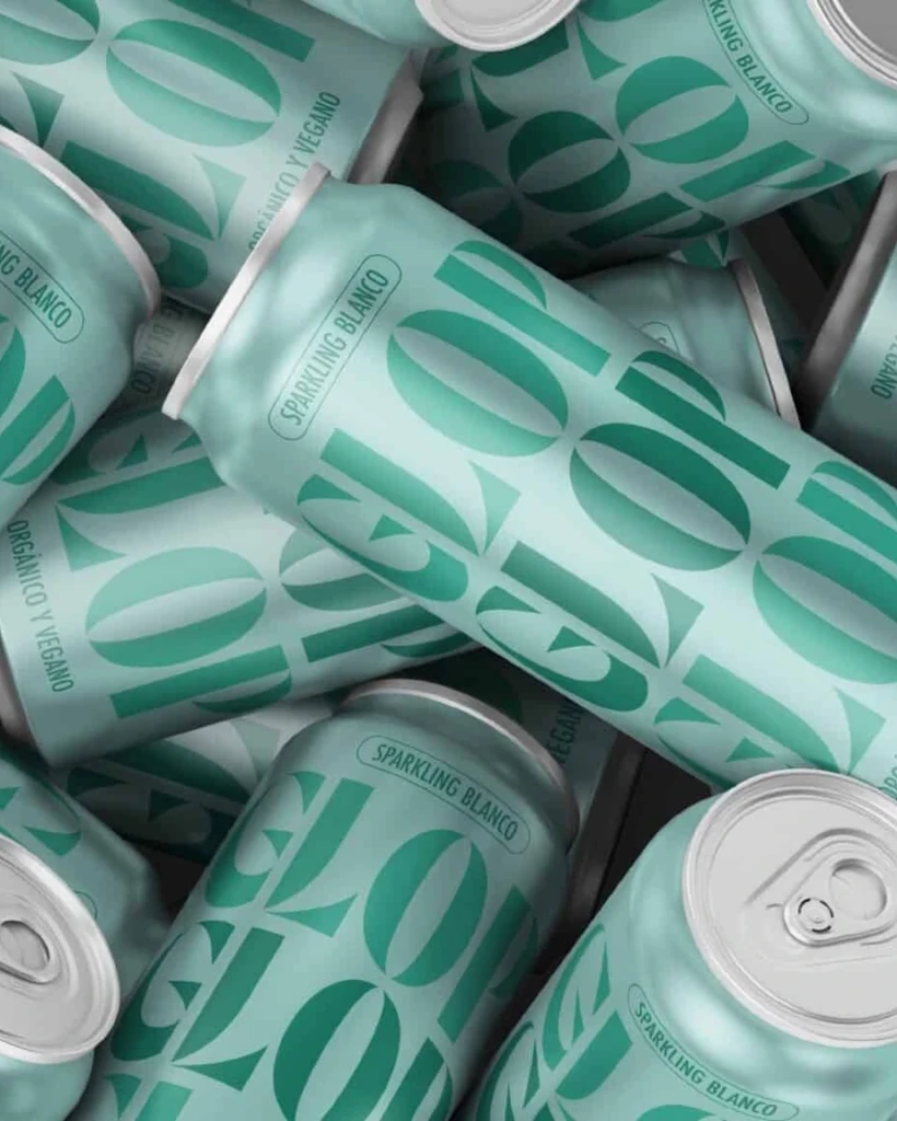 Cans of Glop sparkling white in green, with the logo repeated across them