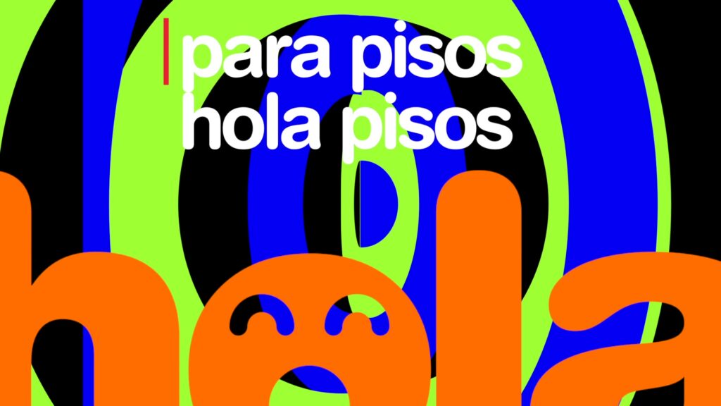 Still from the Hola Pisos brand film, with the line “para pisos hola pisos” (for flats, Hola Pisos)