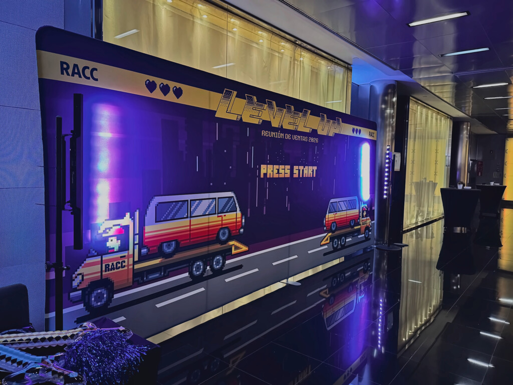 The Level Up “Press Start” photocall, with a pixelated recovery truck carrying a van, at RACC’s 2026 sales meeting