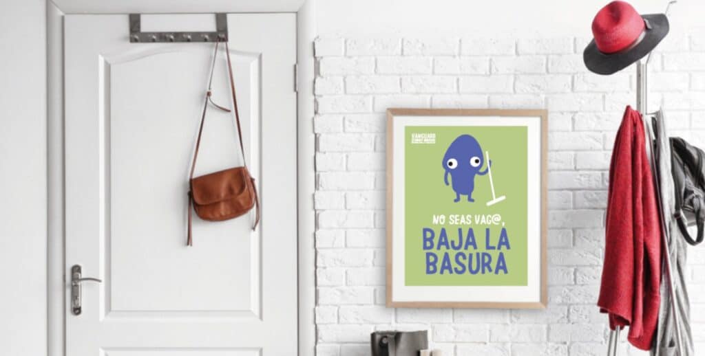Cartel de Vanguard que pide bajar la basura, junto a la puerta de un piso