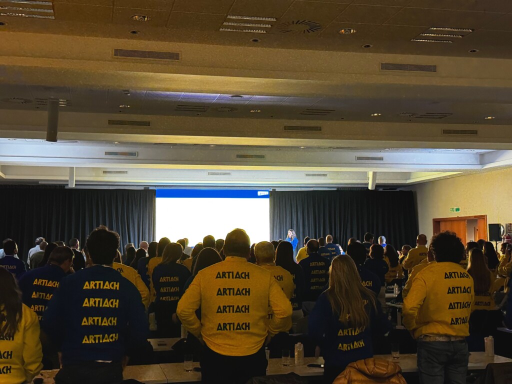 The sales team in yellow Artiach jackets at the Adam Foods sales convention
