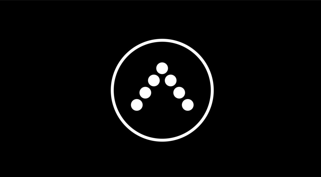 Símbolo de A·WAY: una A de siete puntos dentro de un círculo, en blanco sobre negro