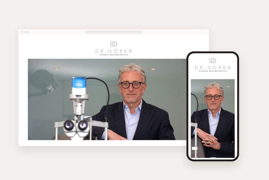 The drgorka.es website on a computer and a phone: the DG monogram, “Dr. Gorka” and “Cirugía oculoplástica” (Oculoplastic surgery) over the doctor’s portrait